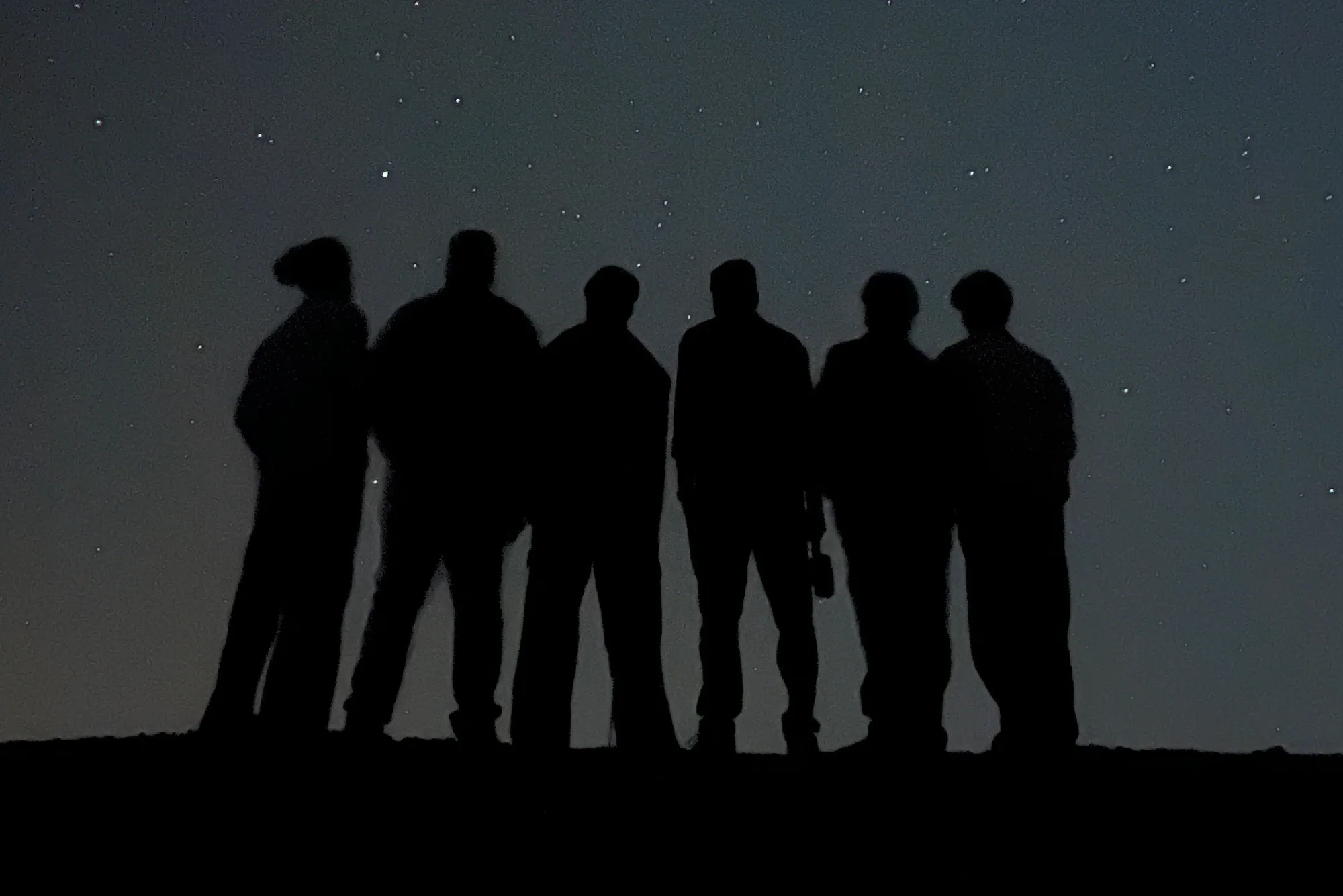 Guests stargazing under a clear night sky at Dreamtime Bungalows, Rajasthan