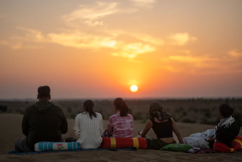 Peaceful sunset experience at the desert dunes by Dreamtime Bungalows